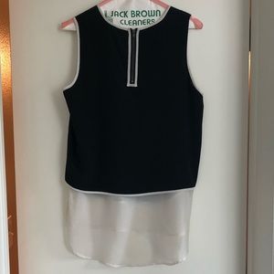 Sleeveless black and white top